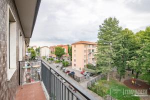 an apartment balcony with a view of a street at Regina in Sesto San Giovanni