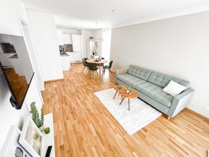 Posezení v ubytování Modern 2 room apartment in downtown