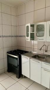 Dapur atau dapur kecil di Casa centro Sorriso +2 gambar
