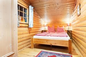 Posteľ alebo postele v izbe v ubytovaní Blockhaus Wallisch
