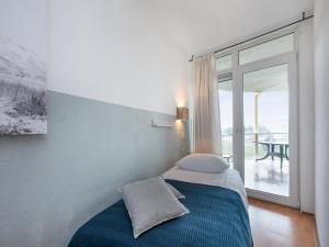 Ένα ή περισσότερα κρεβάτια σε δωμάτιο στο Apartment in Netherlands near Dunes