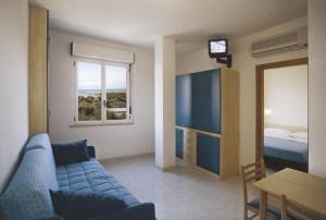 Postel nebo postele na pokoji v ubytování Hotel Strand + 23 fotografií
