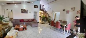 a living room with a couch and a table at الساحل الشمالي in Borg El Arab