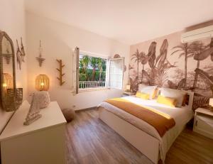 En eller flere senge i et værelse på Les Cactus Fréjus Plage + 33 billeder