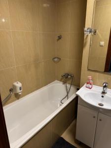 Ванная комната в Apartament Kołobrzeg Kasprowicza +2 фотографии
