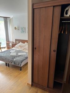 Кровать или кровати в номере Apartament Kołobrzeg Kasprowicza