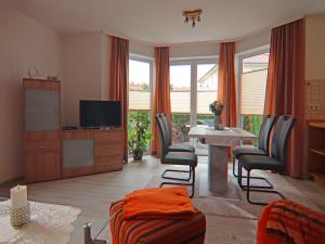 TV a/nebo společenská místnost v ubytování Apartment house Nicole, Zinnowitz