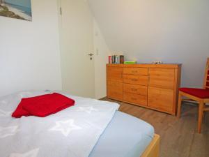 Ein Bett oder Betten in einem Zimmer der Unterkunft Semi-detached house, Zingst