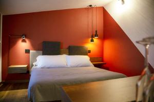 Posteľ alebo postele v izbe v ubytovaní MANTRA Suite&Rooms