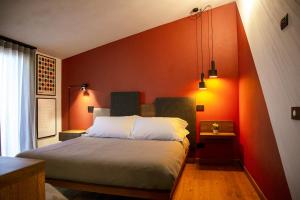 Posteľ alebo postele v izbe v ubytovaní MANTRA Suite&Rooms