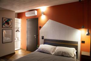 Posteľ alebo postele v izbe v ubytovaní MANTRA Suite&Rooms