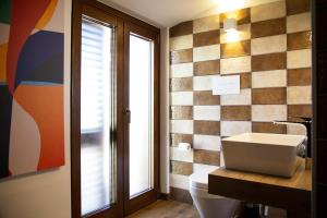 Kúpeľňa v ubytovaní MANTRA Suite&Rooms