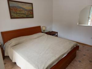 Postel nebo postele na pokoji v ubytování Apartmaji Vrabec