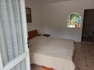 Postel nebo postele na pokoji v ubytování Apartmaji Vrabec