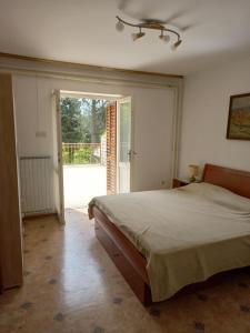 Postel nebo postele na pokoji v ubytování Apartmaji Vrabec
