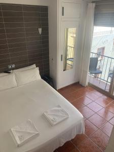 Postel nebo postele na pokoji v ubytování Casa Don Juan