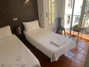 Postel nebo postele na pokoji v ubytování Casa Don Juan