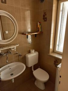 Koupelna v ubytování Apartmaji Vrabec