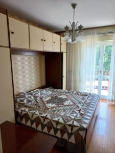 Postel nebo postele na pokoji v ubytování Apartmaji Vrabec