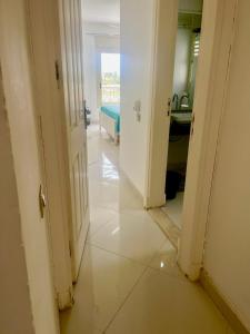 a hallway with a view of a room at Modern 4BDR duplex Lagoon View in Einbay in Ain Sokhna