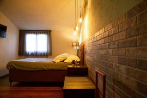 Posteľ alebo postele v izbe v ubytovaní MANTRA Suite&Rooms