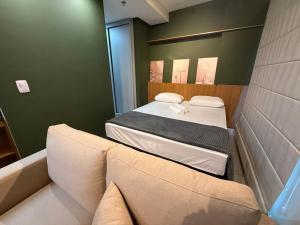 Ένα ή περισσότερα κρεβάτια σε δωμάτιο στο Apartment 63 - Green