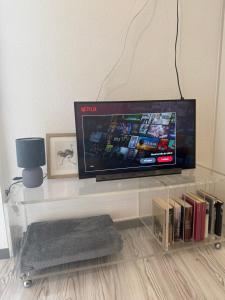 TV a/nebo společenská místnost v ubytování Apartment in Bad Nauheim BX + 4 fotografie