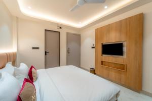 Letto o letti in una camera di Aceotel Select Sarvagya, Vijay Nagar- A Luxury Boutique Hotel -Nipania