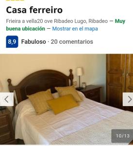 a bedroom with a bed with a yellow pillow at Casa ferreiro in Ribadeo