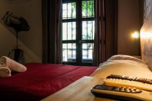 Cama ou camas em um quarto em Hostel Boutique Merced 88
