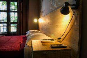 Cama ou camas em um quarto em Hostel Boutique Merced 88