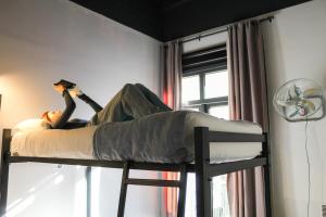 Cama ou camas em um quarto em Hostel Boutique Merced 88