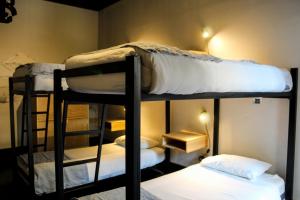 Cama ou camas em um quarto em Hostel Boutique Merced 88