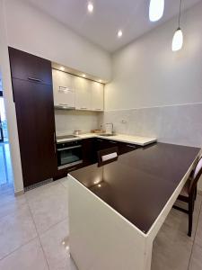 Dapur atau dapur kecil di Shine residence