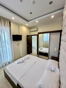 Katil atau katil-katil dalam bilik di Shine residence