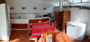 Kuchyň nebo kuchyňský kout v ubytování Obrajillo Eco-Lodge