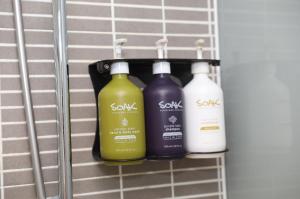 three bottles of soap on a rack at Holiday Inn Brighton Seafront by IHG in Brighton & Hove