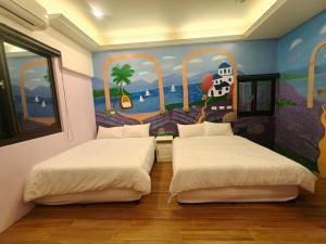 מיטה או מיטות בחדר ב-Xinyuanbao Shangshi Homestay