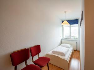 Postel nebo postele na pokoji v ubytování Apartment in Bergen near Sandy Beach