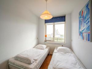 Postel nebo postele na pokoji v ubytování Apartment in Bergen near Sandy Beach