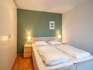Postel nebo postele na pokoji v ubytování Apartment in Bergen near Sandy Beach