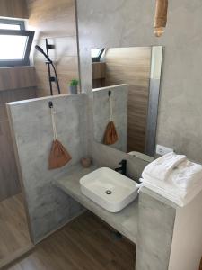 Koupelna v ubytování Alfa-Rooms
