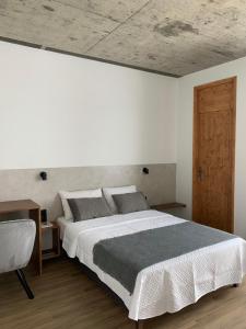 Postel nebo postele na pokoji v ubytování Alfa-Rooms