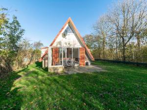 Zahrada ubytování Holiday Home near Groote Keeten Beach
