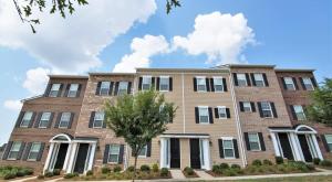 an image of an apartment building at Upscale King 3BR Townhouse in Pineville in Charlotte