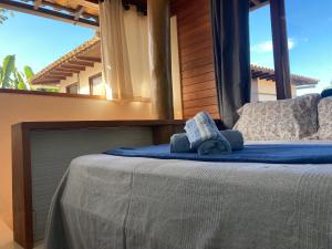 Postel nebo postele na pokoji v ubytování CASA Ecológica Paraty