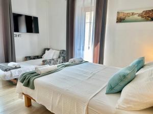 Voodi või voodid majutusasutuse Kelly's Rooms toas
