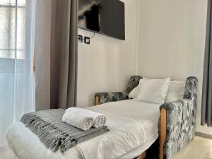 Voodi või voodid majutusasutuse Kelly's Rooms toas