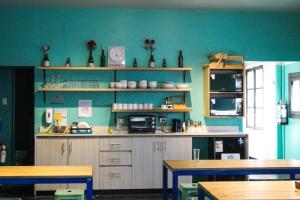 A cozinha ou cozinha compacta de Hostel Boutique Merced 88