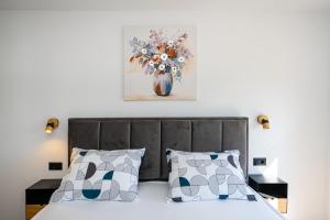 Ένα ή περισσότερα κρεβάτια σε δωμάτιο στο Luxury Apartment Luce